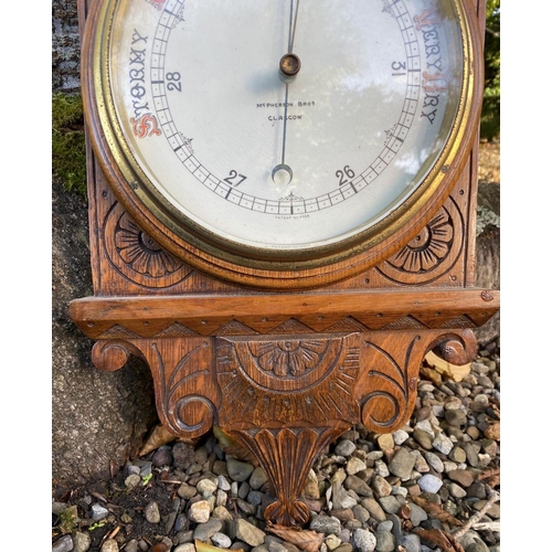 48 - AN ANTIQUE MCPHERSON BROTHERS GLASGOW WHEEL BAROMETER, in finely carved hardwood frame. Dial reading... 