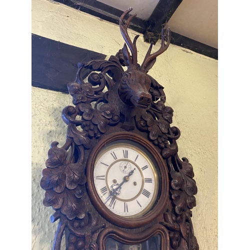 50 - A RARE BLACK FOREST DOUBLE-WEIGHT VIENNA WALL CLOCK, the white enamelled dial with black Roman numer... 