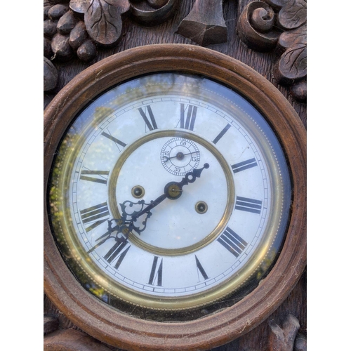 50 - A RARE BLACK FOREST DOUBLE-WEIGHT VIENNA WALL CLOCK, the white enamelled dial with black Roman numer... 