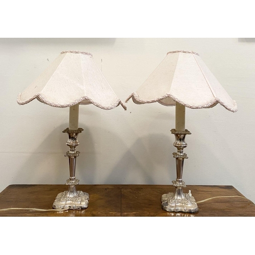 59 - A PAIR OF FINE SILVER PLATED TABLE LAMPS, turned column supports with floral scrolling decoration, s... 