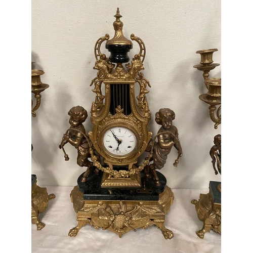 6 - AN IMPERIAL BREVETTATO BRASS AND MARBLE FRANZ HERMLE CLOCK AND CANDLEABRAS, clock with ornate design... 