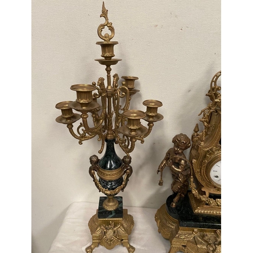 6 - AN IMPERIAL BREVETTATO BRASS AND MARBLE FRANZ HERMLE CLOCK AND CANDLEABRAS, clock with ornate design... 