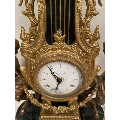 6 - AN IMPERIAL BREVETTATO BRASS AND MARBLE FRANZ HERMLE CLOCK AND CANDLEABRAS, clock with ornate design... 