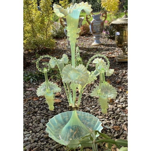 62 - A WONDERFUL VICTORIAN GLASS EPERGNE, with ruffled base supporting three horns and three hanging bask... 