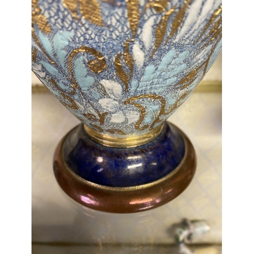 76 - A PAIR OF ROYAL DOULTON VASES, with painted blue neck and base, body decorated with white, gold and ... 