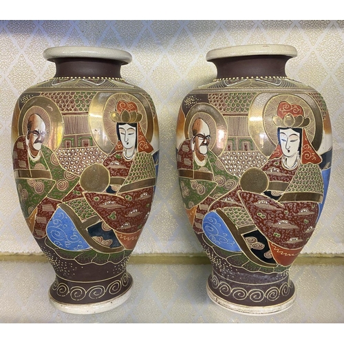 78 - A PAIR OF ANTIQUE JAPANESE SATSUMA VASES, baluster form, complete with circular hardwood bases. Fine... 