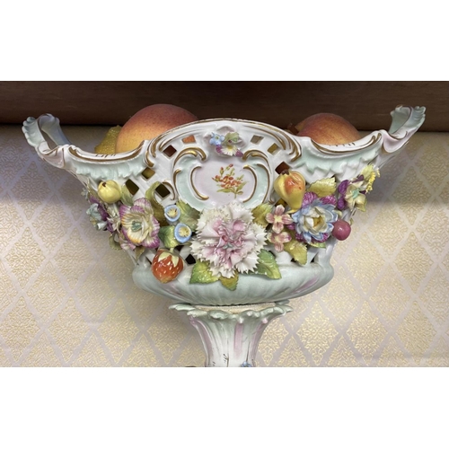 79 - AN ANTIQUE GERMAN PORCELAIN CENTREPIECE, ‘basket’ form compote top with pierced detail, flowers in r... 