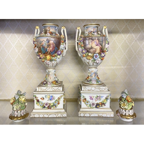 80 - A PAIR OF ORNATE MEISSEN PORCELAIN URN VASES ON PLYNTHS, classical urn form, finely decorated with p... 