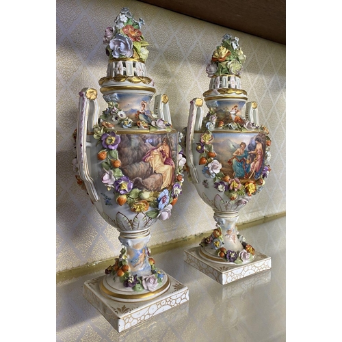 80 - A PAIR OF ORNATE MEISSEN PORCELAIN URN VASES ON PLYNTHS, classical urn form, finely decorated with p... 