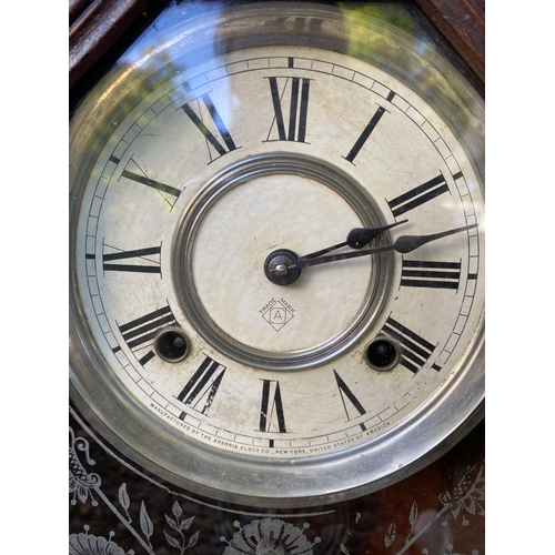 81 - A VINTAGE ANSONIA GINGERBREAD MANTLE CLOCK, in fine carved hardwood case, with wonderful etched glas... 