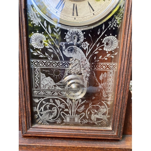 81 - A VINTAGE ANSONIA GINGERBREAD MANTLE CLOCK, in fine carved hardwood case, with wonderful etched glas... 