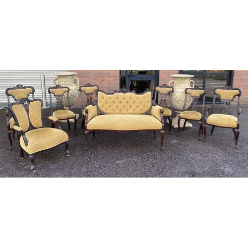 83 - AN EXCELLENT ROSEWOOD NINE PIECE FURNITURE SUITE, to include four chairs, two carvers, settee and tw... 