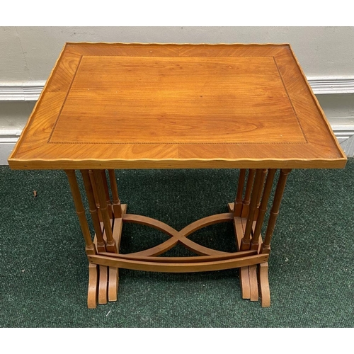 84 - A GOOD CROSSBANDED NEST OF TABLES, three yew-wood tables with crossbanding to top, turned supports a... 