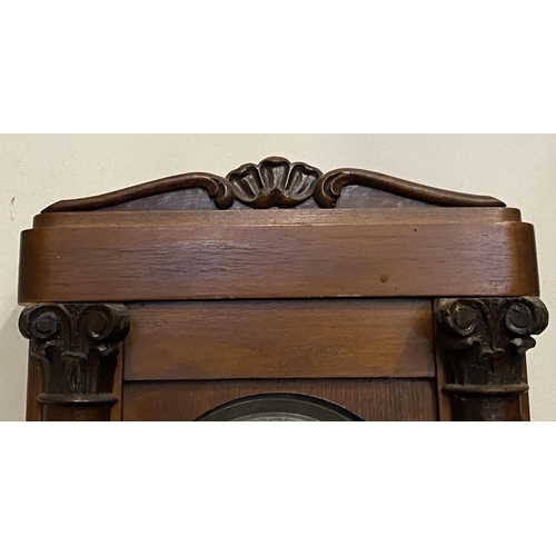 85 - AN ANTIQUE MAHOGANY WALL CLOCK, rectangular form, with carving to cornice, column carvings to either... 