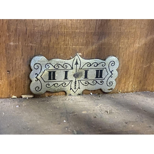 85 - AN ANTIQUE MAHOGANY WALL CLOCK, rectangular form, with carving to cornice, column carvings to either... 