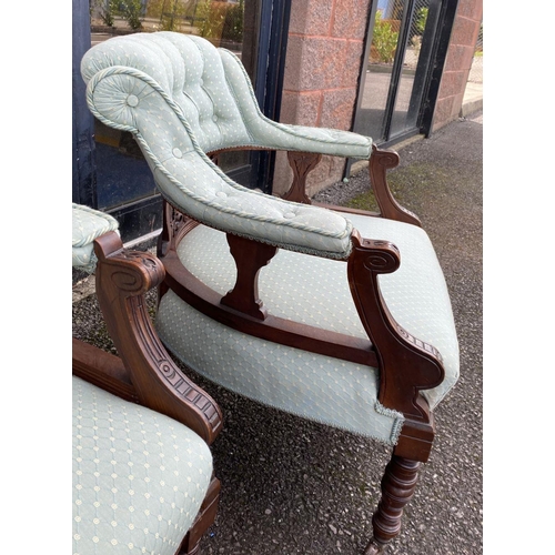 90 - A PAIR OF FINE VICTORIAN MAHOGANY ARMCHAIRS, upholstered with button back atop carved back splat, wi... 