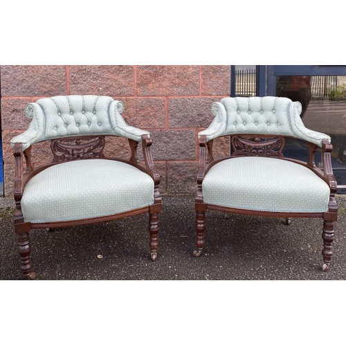 90 - A PAIR OF FINE VICTORIAN MAHOGANY ARMCHAIRS, upholstered with button back atop carved back splat, wi... 