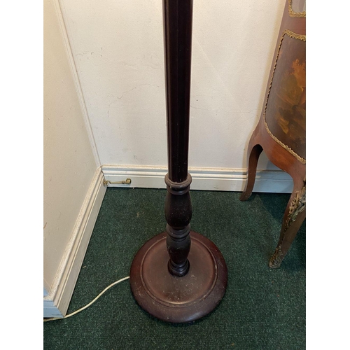 94 - AN ANTIQUE MAHOGANY FLOOR LAMP, with turned support on circular base, complete with lampshade with f... 