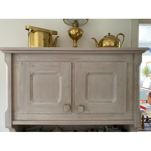 332 - AN VINTAGE PINE KITCHEN DRESSER, c.1970, with cornice above two doors, opening to shelved interior, ... 