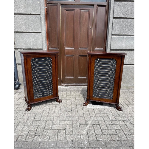 21 - A GOOD QUALITY PAIR OF REGENCY MAHOGANY FLOOR BOOKCASES / CABINETS, each with a grille door and rais... 