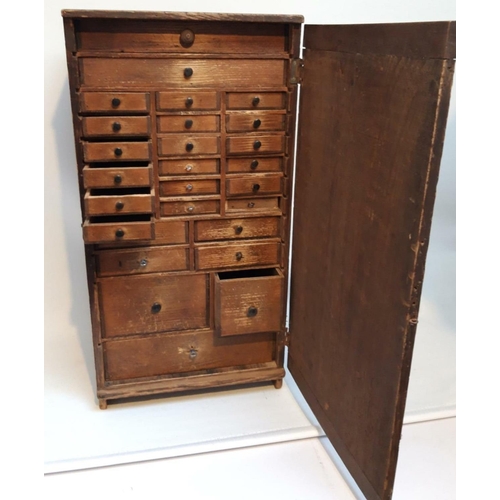 23 - A RARE & CHARMING CLOCK / WATCHMAKER’S CABINET, circa 1900, the cabinet has a hinged door to the fro... 