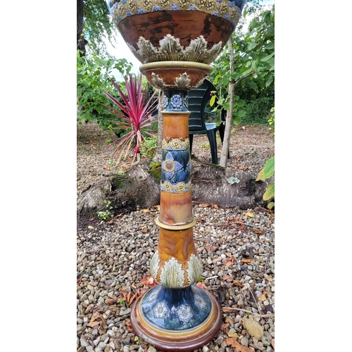 31 - A VERY GOOD QUALITY ROYAL DOULTON JARDINERÉ POT & STAND, the pot with floral design having foliage d... 