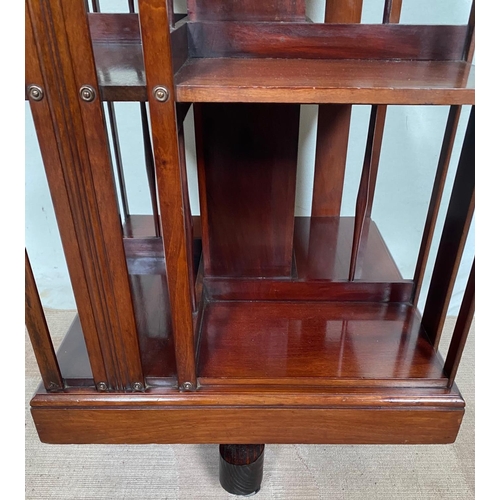 40 - A VERY GOOD QUALITY MAHOGANY INLAID REVOLVING BOOKCASE, to the top can be seen a central inlaid scro... 