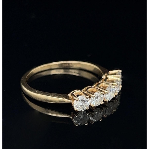 5 - A CLASSICAL BEAUTY: 5 STONE 14CT YELLOW GOLD DIAMOND RING, with a total of 1.25cts in sparkling diam... 