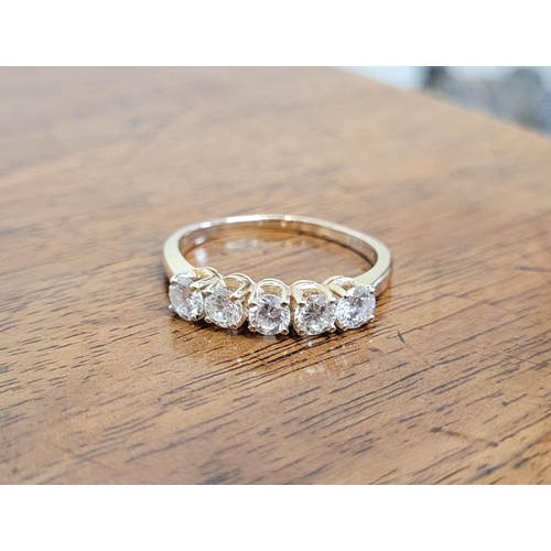 5 - A CLASSICAL BEAUTY: 5 STONE 14CT YELLOW GOLD DIAMOND RING, with a total of 1.25cts in sparkling diam... 