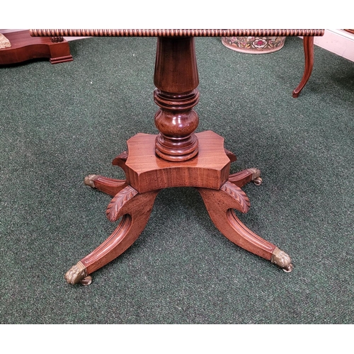 57 - A GOOD QUALITY REGENCY MAHOGANY FOLD OVER CARD TABLE, the top turns and folds open to rest upon the ... 