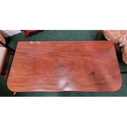 57 - A GOOD QUALITY REGENCY MAHOGANY FOLD OVER CARD TABLE, the top turns and folds open to rest upon the ... 