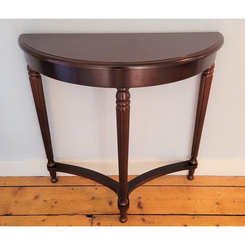 247 - A GOOD QUALITY DEMI-LUNE SHAPED SIDE / CONSOLE TABLE, contemporary piece of furniture in the antique... 