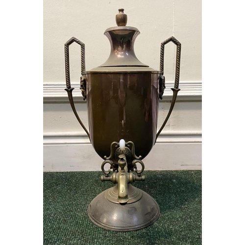 82 - AN ANTIQUE WILLIAM C. BURTON COPPER SAMOVAR, urn form with shaped engraved handles, decorative tap, ... 