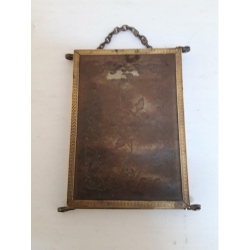 101 - A VICTORIAN THREE PANEL FOLDING TRAVELLING MIRROR, with tooled leather backing, 33 x 14cm when open.... 