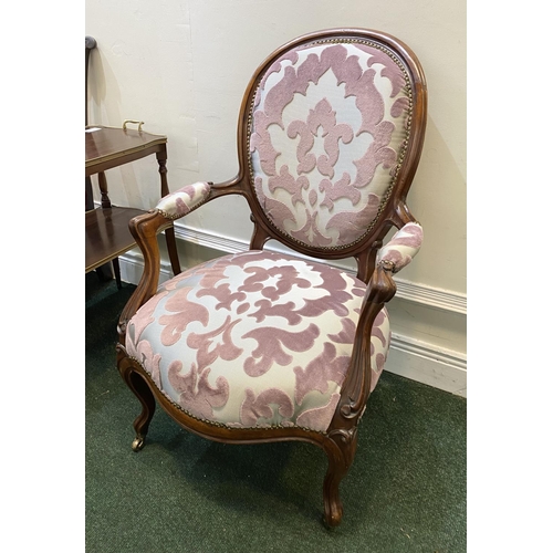 103 - A FRENCH LOUIS XVI STYLE ARMCHAIR, with upholstered seat armrests and backrest in decorative fabric,... 