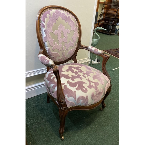 103 - A FRENCH LOUIS XVI STYLE ARMCHAIR, with upholstered seat armrests and backrest in decorative fabric,... 