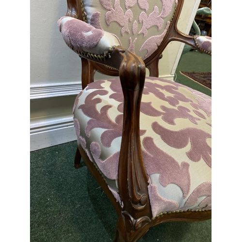 103 - A FRENCH LOUIS XVI STYLE ARMCHAIR, with upholstered seat armrests and backrest in decorative fabric,... 