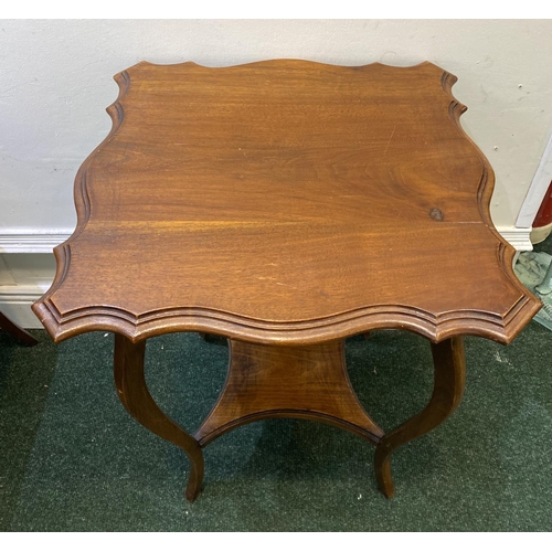 107 - AN ANTIQUE MAHOGANY SERPENTINE SHAPED OCCASSIONAL TABLE, standing on cabriole leg conjoined by shape... 