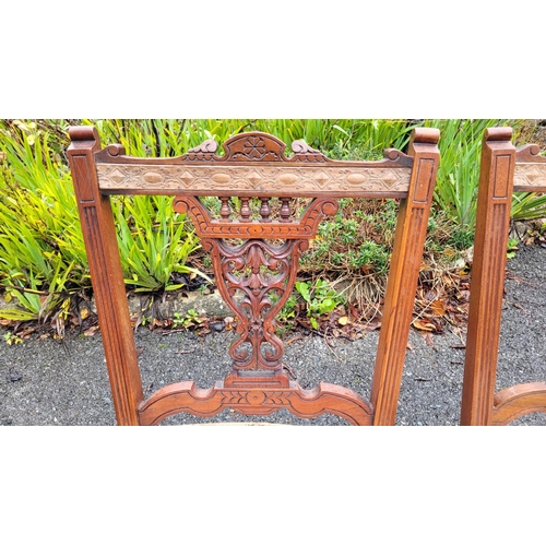 117 - A LOVELY PAIR OF EDWARDIAN LOW RISE ‘NURSING’ / BEDROOM CHAIRS, each with a carved & pierced back re... 