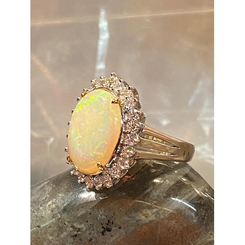 12 - A UNIQUE 18CT WHITE GOLD AUSTRALIAN FIRE OPAL & DIAMOND RING, opal weight: 4.07cts, surrounded by 1.... 