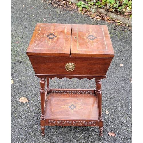 126 - AN EDWARDIAN SARCOPAGUS SHAPED WORKS TABLE, the top has a pair of hinged doors that are nicely decor... 