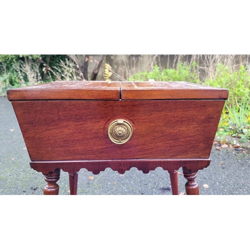 126 - AN EDWARDIAN SARCOPAGUS SHAPED WORKS TABLE, the top has a pair of hinged doors that are nicely decor... 