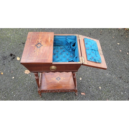 126 - AN EDWARDIAN SARCOPAGUS SHAPED WORKS TABLE, the top has a pair of hinged doors that are nicely decor... 