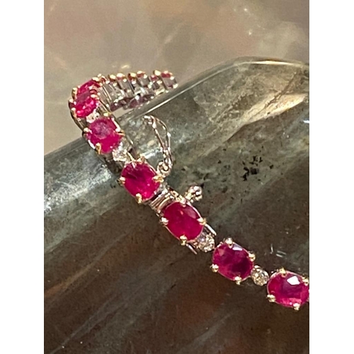 13 - A BEAUTIFUL 18CT WHITE GOLD BURMESE RUBY AND DIAMOND TENNIS BRACELET, claw set, ruby weight 12.48cts... 