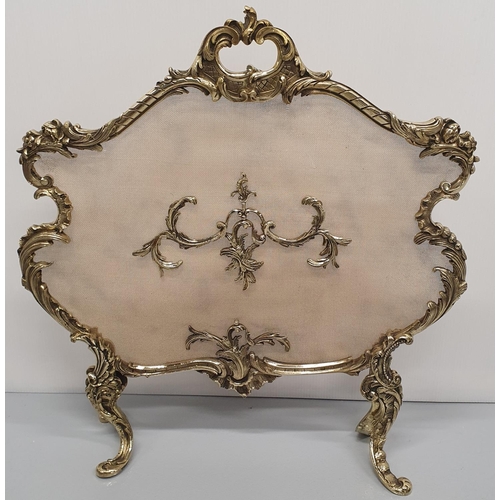 132 - A VERY FINE TOP QUALITY 19TH CENTURY POLISHED BRASS FRAMED FIRESCREEN, the frame decorated all over ... 