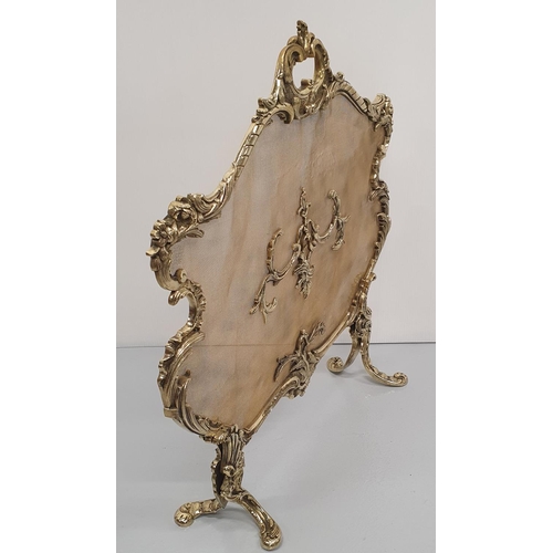 132 - A VERY FINE TOP QUALITY 19TH CENTURY POLISHED BRASS FRAMED FIRESCREEN, the frame decorated all over ... 