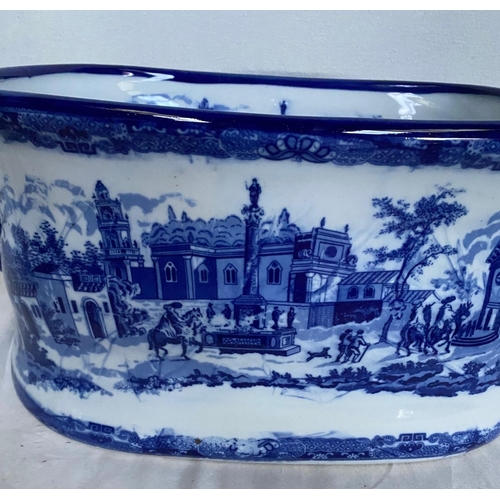 136 - A BLUE & WHITE PORCELAIN ‘FOOT BATH’ PLANTER / WINE COOLER, with a pair of handles in an oblong shap... 