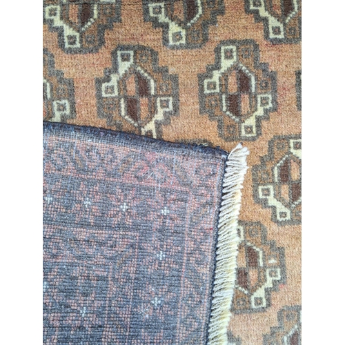 142 - AN ANTIQUE BELOUCH FLOOR RUG / PRAYER RUG, hand-knotted with tradition colour & design. 130 x 80cm.