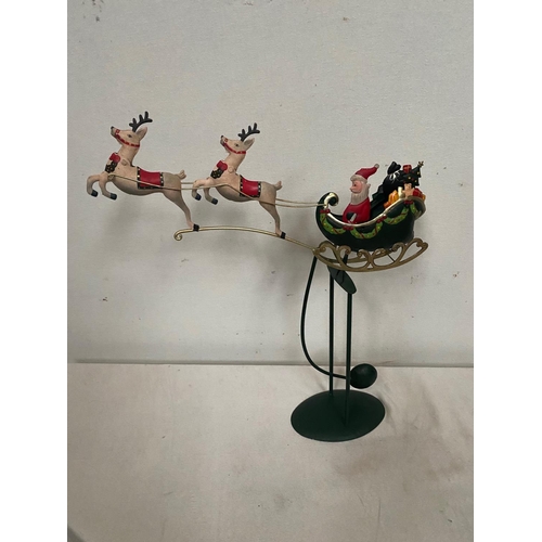 161 - A DELIGHTFUL CHRISTMAS TABLE / WINDOW CILL DECORATION, with Santa seated in his green sleigh and two... 