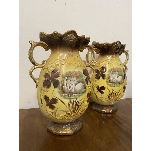 168 - A PAIR OF LOVELY VINTAGE BRITISH PAINTED PORCELAIN VASES, ornate shape with double scroll handles, d... 